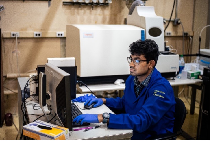 PhD student Chai Peddeti working on the Mass spec (Photo Credit: AJ Gubser). 